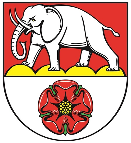 Wappen der Gemeinde Kuchen, Elefant darunter rote Blume
